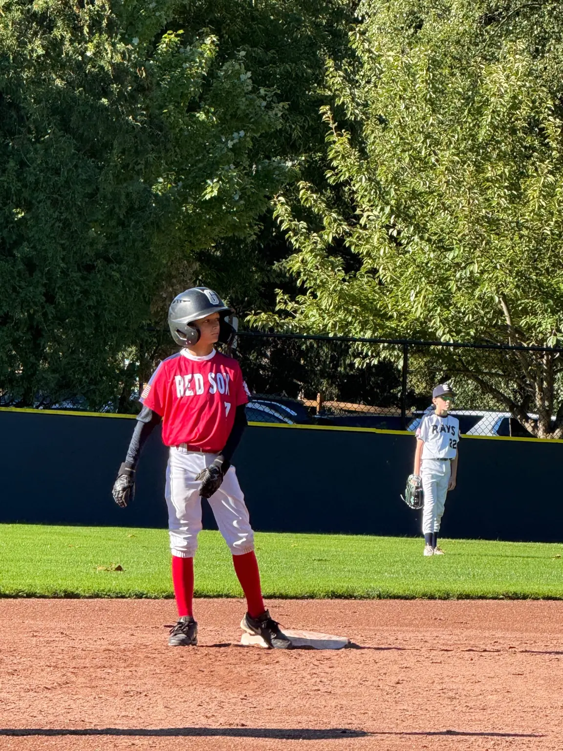 Young baseball player on the field in the Dominican Republic