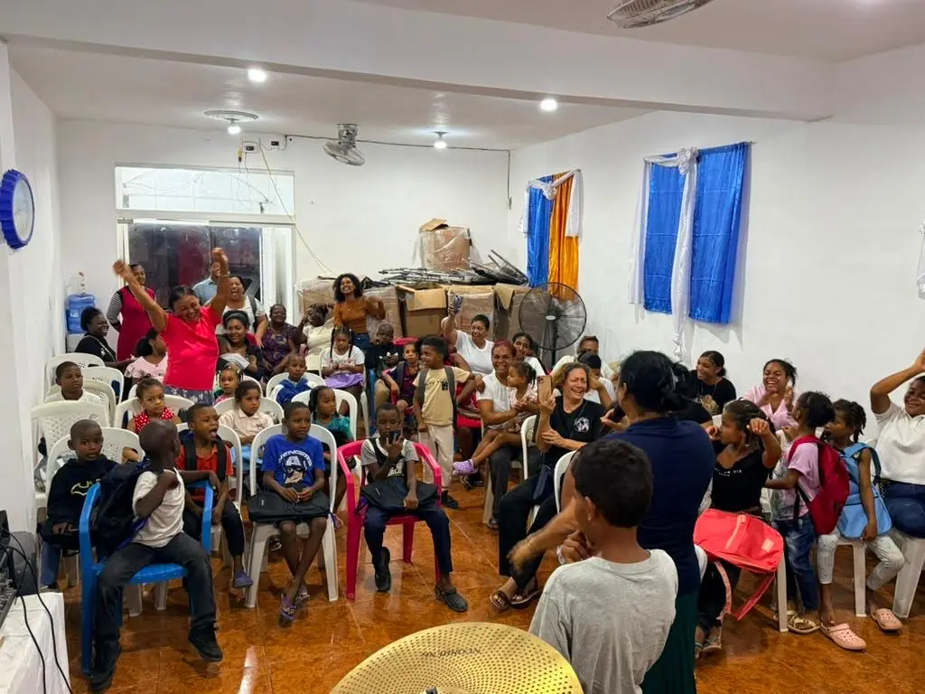 Families and children gathered for the backpack drive