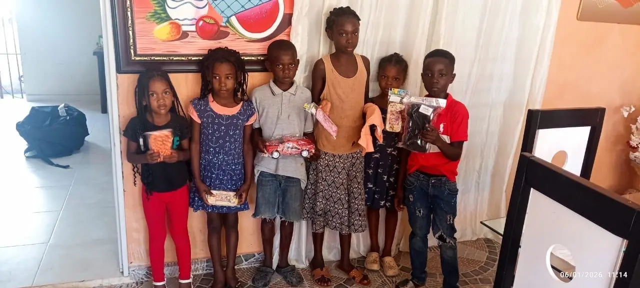 Children standing together with their newly received toys