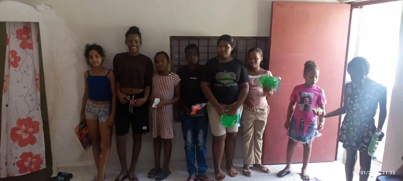 Young people participating in a community toy distribution