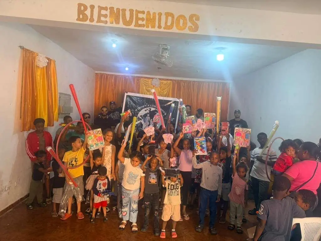 Children celebrating together with colorful new toys